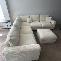 L shape sectional with free ottaman