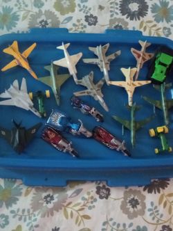 Metal airplanes and Harley-Davidsons metal bikes and three metal tractors John Deere