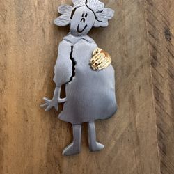 Vintage “Ultra Craft” pewter and gold tones pregnant woman brooch 3.25” x 1.5”. “Ultra Craft” was founded in 1970 by Luigi B. Guadagno. He has designe