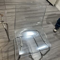 2 Clear Chairs $100 For Both 
