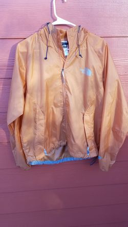 Orange The North Face jacket windbreaker