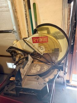RYOBI 10-inch Compound Miter Saw, likely model TS1340, featuring a yellow blade guard