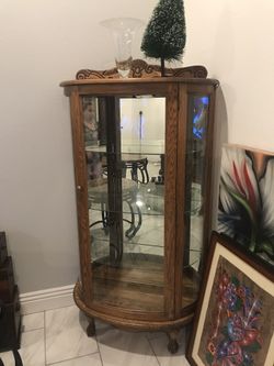 Rustic antique curio cabinete