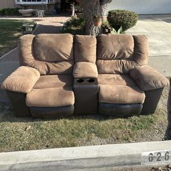 Signature Design by Ashley Earhart Reclining Loveseat with Console 