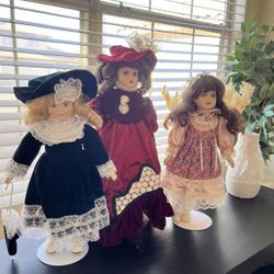 Porcelain Dolls With Stands. $10 Each.