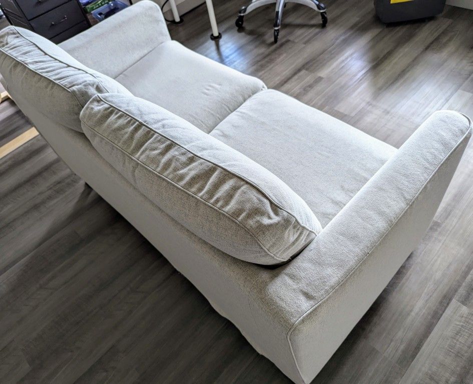 IKEA Sofa Width: 65 " Height including back cushions: 33 7/8 "