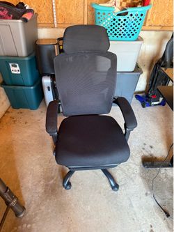 Gaming chair with foot rest