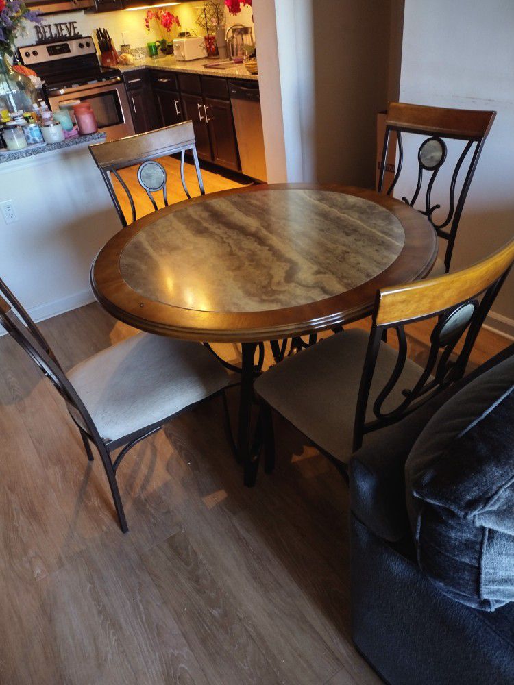 DINETTE SET TABLE AND FOUR CHAIRS 