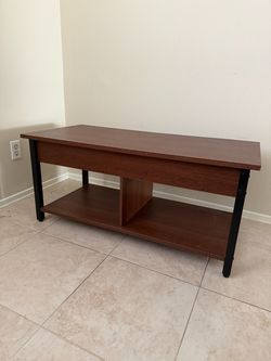 Coffee table with lift top