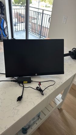 22 inch computer mounted on a movable stand