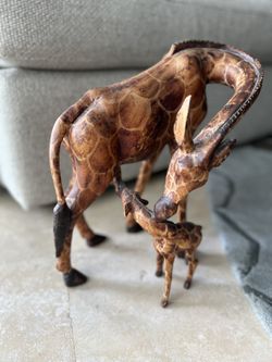 One solid piece of Hand carved wood Giraffe and baby