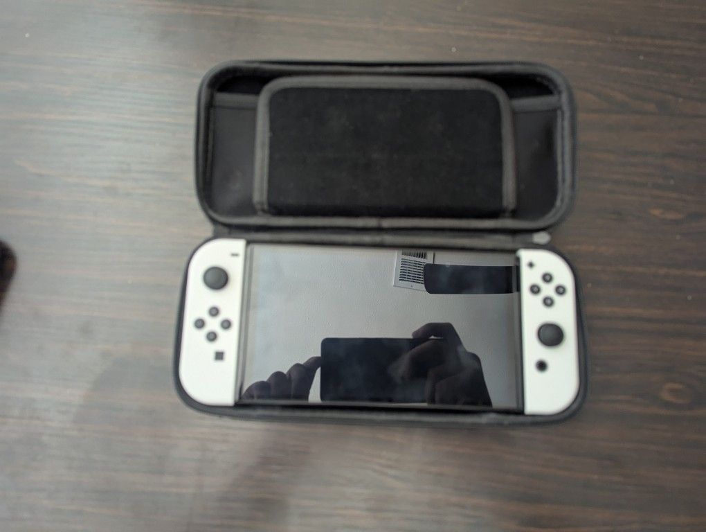 Nintendo switch Oled 4 Games Included