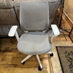 Office chair-adjust the height ( branh new at store $ 149 add more tax)