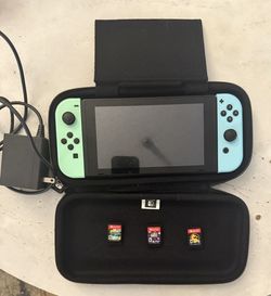 Nintendo Switch (Animal crossing Edition) + 3 Games & Case - 275