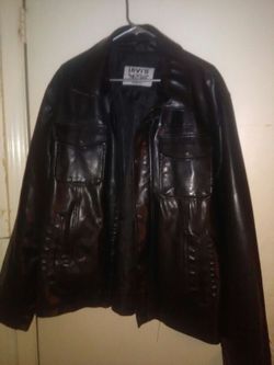 NEW LADIES SIZE SMALL, BLACK LEATHER JACKET