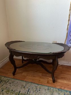 Vintage carved coffee table with eagle detail
