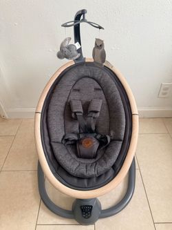 Baby swing activity center changing pad