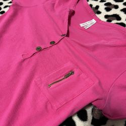 Pink button-up top with zipper pocket