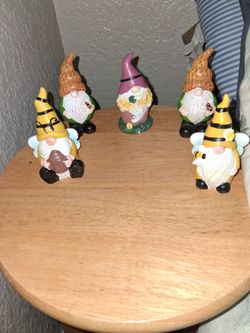 Ceramic bird houses and gnomes.
