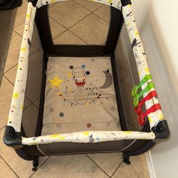     Baby Trend Foldable Playpen – Wavy Train Collection – With Wheels