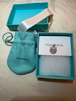 Authentic Tiffany & Co. Silver Cat Charm Pendant w/ Original Box, Pouch, Ribbon  Description: Up for sale is a beautiful, 100% authentic Tiffan
