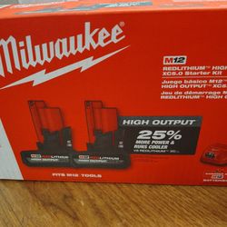 Milwaukee Two 5.0ah High Output Batteries And Charger