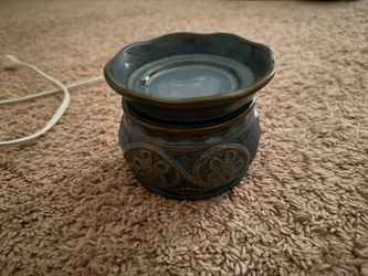 Blue and brown candle and wax warmer