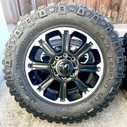 20” Ram 2500 Rebel 2024 OEM Black Wheels and 35x12.5r20 Mickey Thompson Mud Tires 12 Ply 95% Tread