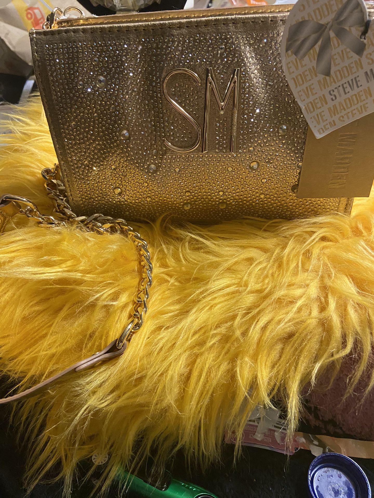 Brand new Steve Madden Crossbody handbag, and the color rose gold with gold chain