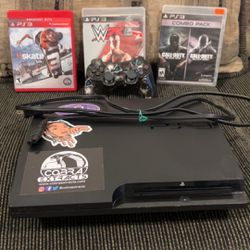 PS3 W/ 4 Games, Controller And Power Chord