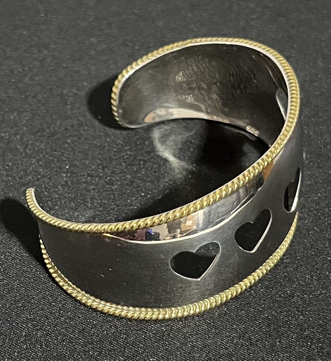 Sterling Silver Bracelet With Heart Design