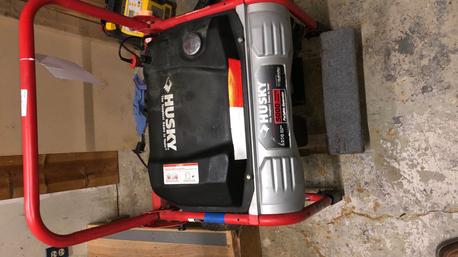 1003 Husky HU50011 Gas Powered 6250watt Generator W/ Handle On Wheels( Leaks Gas From Top Fuel Line Valve) 012457