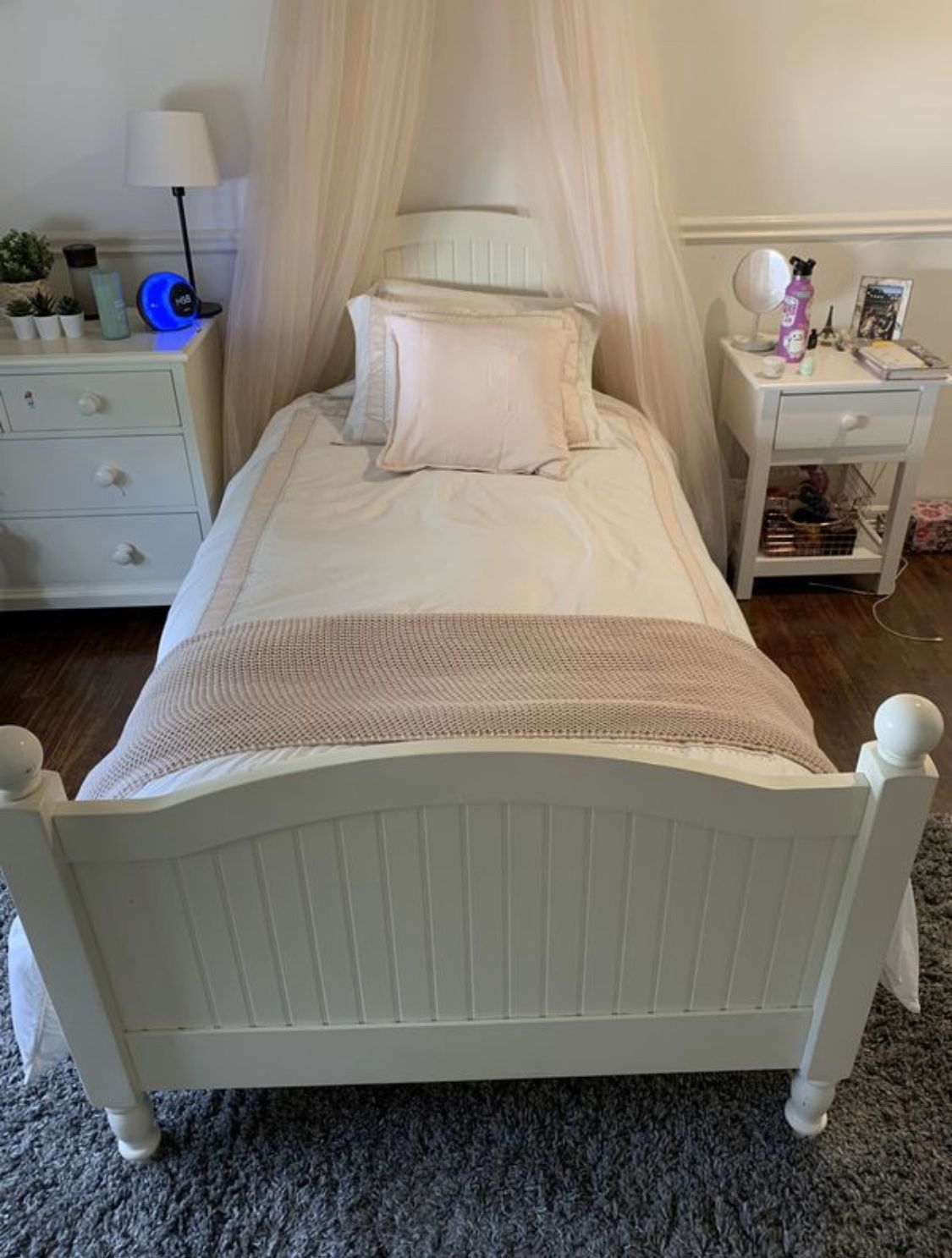 White twin bed, dresser, nightstand and mattress. Pottery barn.