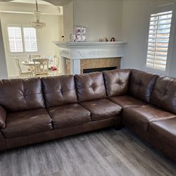 L shaped couch and free table