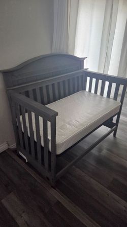 New Never Used 4 in 1 convertible crib with waterproof mattress included