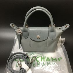 "LongChamp Le Pliage Neo Mini pouch with Shoulder Strap 
"
