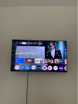 TCL 40 inch Q3K series 1080p HD QLED smart TV (With wall mount if wanted)