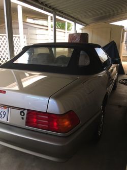 1995 SL320 Mercedes 2 seat roadster very clean runs great clean title moving have to let go of my beautiful classy car soon. Reasonable offers only c
