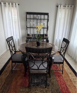 Steve Silver Hamlyn collection, featuring a round marble-top dining table and baker’s rack🔺
