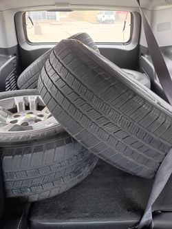 4 Suburban tires with rims