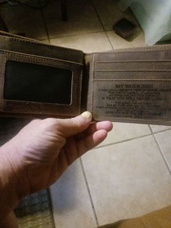 Brand new brown leather wallet has a beautiful saying inside