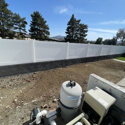 Vinyl And Wood Fence