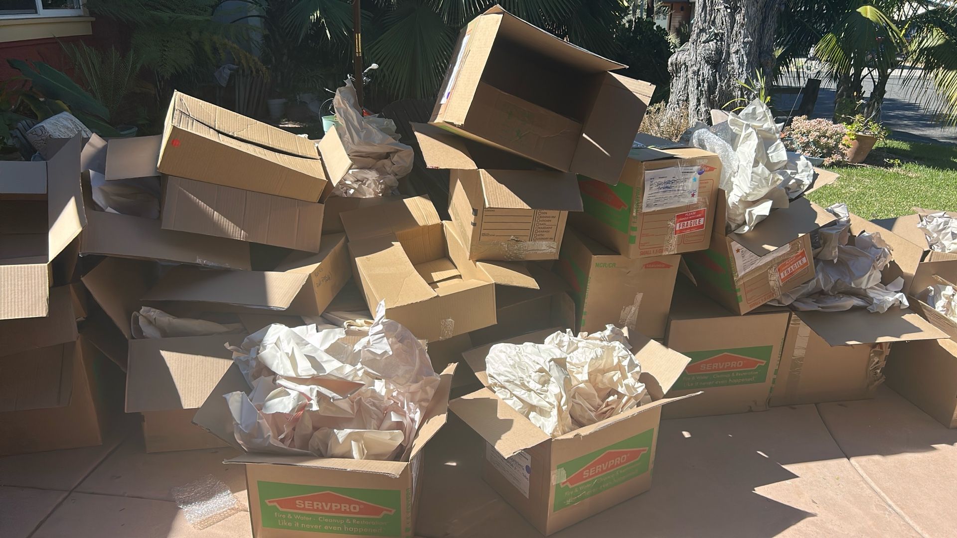 FREE- LOTS OF USED ONCE SERVPRO CARDBOARD MOVING BOXES