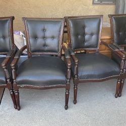 Four Arm Chairs