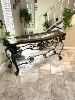 Console table with removable glass top and iron frame and legs with marble down 65” long 22” deep 34” height good condition