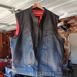 Genuine leather red and black motorcycle vest.What?What two pockets on the inside for concealed carry