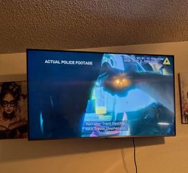 Flat Screen Wall-Mounted TV 47"