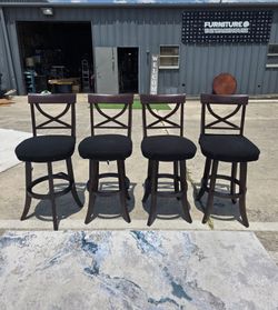 Set of 4 used bar-heigjt swivel stools, $100