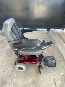 Electric wheelchair shprider