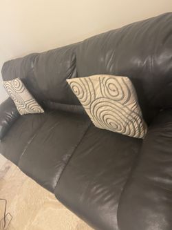 Black Leather Couch In Good Condition